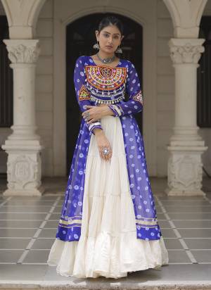 Looking These Navratri Special Lehenga Kurti in Fine Colored. These Lehenga Are Kora Cotton And Kurti Are Fabricated On Faux Georgette Fabriced. It is Beautified With Designer Bandhani Printed With Traditional Kutchi Patch Work.