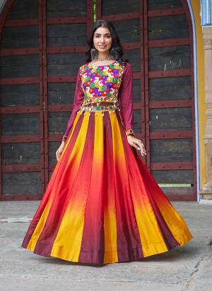 Attractive These Navratri Special Lehenga Top in Fine Colored. These Lehenga Are Chinon And Top Are Fabricated On Chinon Fabriced. It is Beautified With Designer Pedding Color With Traditional Kutchi Gamthi Embroidery Work.