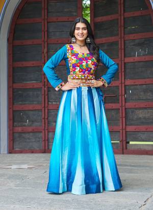 Attractive These Navratri Special Lehenga Top in Fine Colored. These Lehenga Are Chinon And Top Are Fabricated On Chinon Fabriced. It is Beautified With Designer Pedding Color With Traditional Kutchi Gamthi Embroidery Work.