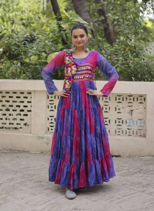 Garb These Beautiful Navratri Wear Readymade Long Gown.These Gown is Fabricated On Faux Georgette.Its Beautified With Bandhej Printed With Kutchi Gamthi Patch Embroidery Work.