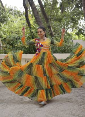 Garb These Beautiful Navratri Wear Readymade Long Gown.These Gown is Fabricated On Faux Georgette.Its Beautified With Bandhej Printed With Kutchi Gamthi Patch Embroidery Work.