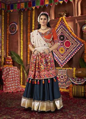 Attrective These Navratri Special Lehenga Choli in Fine Colored.These Lehenga Are Viscose Cotton And Blouse Are Viscose Cotton And Dupatta Are Fabricated On Viscose Cotton.Its Beautified With Designer Multy Thread,Mirror Embroidery,Hand Work.