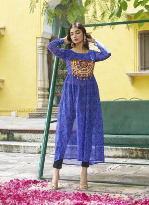Garb These Beautiful Looking Readymade Navratri Kurti.These Kurti is Fabricated On Faux Georgette.Its Beautified With Bandhej Printed Designer With Kutchi Patch Work.