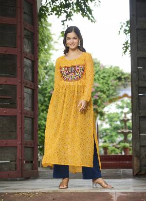 Garb These Beautiful Looking Readymade Navratri Kurti.These Kurti is Fabricated On Faux Georgette.Its Beautified With Bandhej Printed Designer With Kutchi Patch Work.