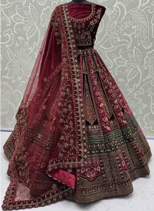 For A Fancy Designer Look,Grab These Lehenga Choli With 2 Dupatta in Fine Colored.These Lehenga And Choli Are Velvet And Dupatta Are Fabricated On Soft Net & Velvet Pair.Its Beautified With Designer Sequance,Mirrar,Dori,Multy Thread Embroidery With Zarkan Diamond Work. 