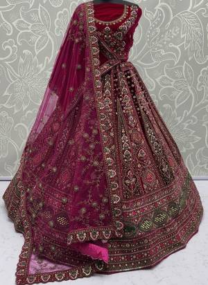 For A Fancy Designer Look,Grab These Lehenga Choli With 2 Dupatta in Fine Colored.These Lehenga And Choli Are Velvet And Dupatta Are Fabricated On Soft Net & Velvet Pair.Its Beautified With Designer Sequance,Mirrar,Jari,Multy Thread Embroidery With Zarkan Diamond Work. 