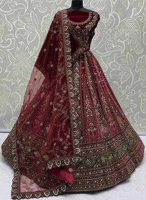 For A Fancy Designer Look,Grab These Lehenga Choli With 2 Dupatta in Fine Colored.These Lehenga And Choli Are Velvet And Dupatta Are Fabricated On Soft Net & Velvet Pair.Its Beautified With Designer Sequance,Mirrar,Jari,Multy Thread Embroidery With Zarkan Diamond Work. 