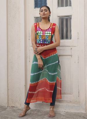 Garb These Beautiful Looking Readymade Navratri Kurti.These Kurti is Fabricated On Georgette.Its Beautified With Bandhej Printed Designer With Kutchi Gamthi Mirror Work.