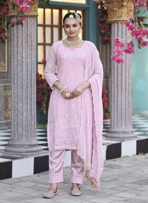 Attrective These Party Wear Suit in Fine Colored Pair With Bottom And Dupatta.These Top Are Georgette And Dupatta Are Fabricated On Georgette Pair With Santoon Bottom.Its Beautified With Designer Heavy Embroidery Work.