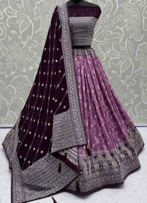 For A Fancy Designer Look,Grab These Lehenga Choli With Dupatta in Fine Colored.These Lehenga And Choli Are Georgette And Dupatta Are Fabricated On Georgette Pair.Its Beautified With Woven Jari Designer With Mirror Embroidery Work. 