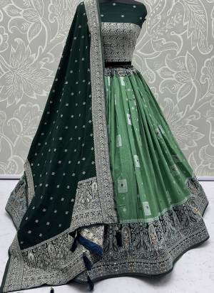For A Fancy Designer Look,Grab These Lehenga Choli With Dupatta in Fine Colored.These Lehenga And Choli Are Georgette And Dupatta Are Fabricated On Georgette Pair.Its Beautified With Woven Jari Designer With Mirror Embroidery Work. 