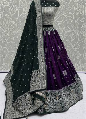 For A Fancy Designer Look,Grab These Lehenga Choli With Dupatta in Fine Colored.These Lehenga And Choli Are Georgette And Dupatta Are Fabricated On Georgette Pair.Its Beautified With Woven Jari Designer With Mirror Embroidery Work. 