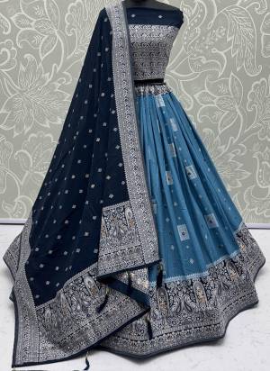 For A Fancy Designer Look,Grab These Lehenga Choli With Dupatta in Fine Colored.These Lehenga And Choli Are Georgette And Dupatta Are Fabricated On Georgette Pair.Its Beautified With Woven Jari Designer With Mirror Embroidery Work. 