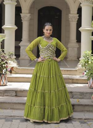 Attractive These Navratri Special Lehenga Choli in Fine Colored. These Lehenga Are Faux Georgette And Blouse Are Fabricated On Faux Georgette Fabriced. It is Beautified With Lahariya Printed Designer With Mirror Lace Work.