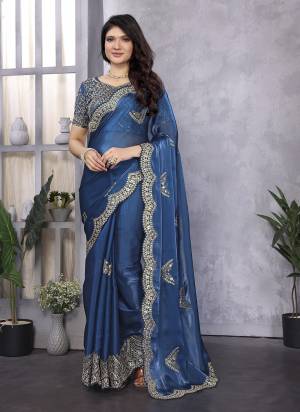 Looking These Fastive And Party Wear Saree in Fine Colored.These Saree And Blouse is Fabricated On Shimmer Chiffon.Its Beautified With Heavy Designer Sequance Embroidery Work.