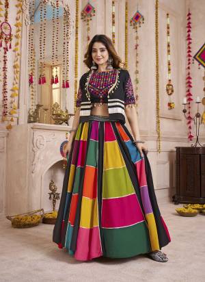 Garb These Navratri Special Lehenga Choli in Fine Colored.These Lehenga Are Viscose Cotton And Blouse Are Viscose Cotton Fabricated.Its Beautified With Designer Kutchi Patch,Mirror Work.