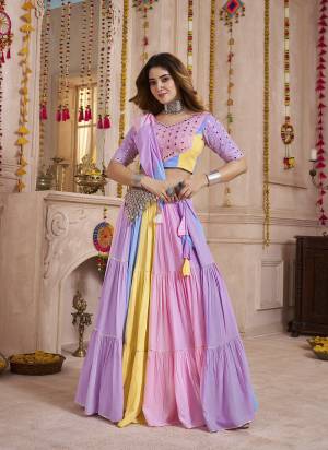 Garb These Navratri Special Lehenga Choli in Fine Colored.These Lehenga Are Viscose Cotton And Blouse Are Viscose Cotton And Dupatta Are Fabricated On Viscose Cotton.Its Beautified With Designer Kutchi Patch,Mirror Work.