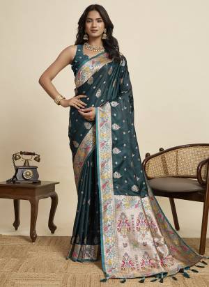 Looking This Party Wear Two Tone Saree Paired With Blouse.This Saree And Blouse Are Two Tone Satin Silk Fabric With Wevon Meenakari Designer. Buy This Pretty Saree Now.