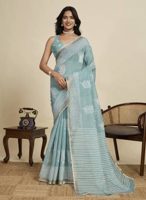 Looking This Party Wear  Saree Paired With Blouse.This Saree And Blouse Are Linen Fabricated With Wevon Jari Border With Designer Digital Printed. Buy This Pretty Saree Now.
