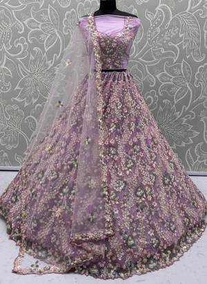 For A Fancy Designer Look,Grab These Lehenga Choli With Dupatta in Fine Colored.These Lehenga And Choli Are Net And Dupatta Are Fabricated On Net Pair.Its Beautified With  5 Color Sequance,Flower Pattern,Multy Thread Embroidery Work. 