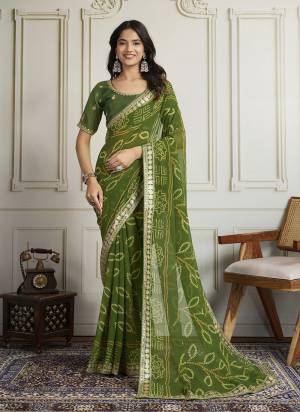 Attrective These Party Wear Saree in Fine Colored.These Saree Are Georgette And Blouse is Art Silk Fabricated.Its Beautified With Bandhani Printed With Embroidery Work Lace Border And Blouse.