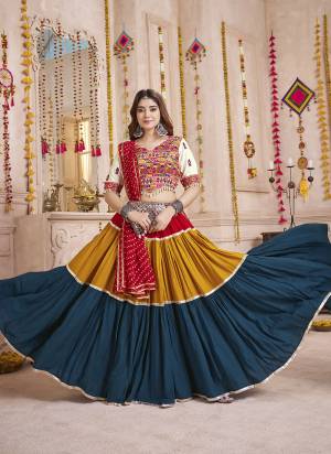 Looking These Navratri Special Lehenga Choli in Fine Colored.These Lehenga Are Viscose Cotton And Blouse Are Viscose Cotton And Dupatta Are Fabricated On Georgette.Its Beautified With Designer Multy Thread,Mirror Embroidery,Hand Work.