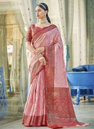 Garb These Fastive And Party Wear Saree in Fine Colored.These Saree And Blouse is Fabricated On Linen Cotton.Its Beautified With Heavy Woven Designer.
