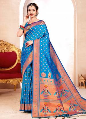Attractive These Fastive And Party Wear Saree in Fine Colored.These Saree And Blouse is Fabricated On Paithani Silk.Its Beautified With Heavy Woven Meenakari Designer.