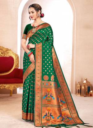 Attractive These Fastive And Party Wear Saree in Fine Colored.These Saree And Blouse is Fabricated On Paithani Silk.Its Beautified With Heavy Woven Meenakari Designer.