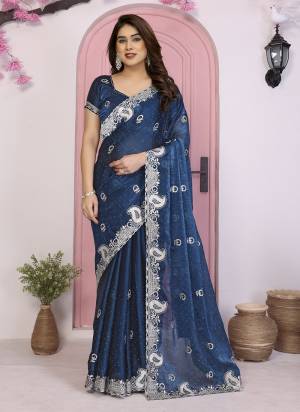 Attrective These Party Wear Saree in Fine Colored.These Saree Are Frendy Chiffon And Blouse is Frendy Chiffon Fabricated.Its Beautified With Designer Jari Embroidery,Stone Work.