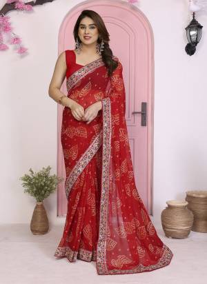 Garb These Party Wear Saree in Fine Colored.These Saree Are Georgette And Blouse is Art Silk Fabricated.Its Beautified With Bandhani Printed Designer With Embroidery Work Lace Border.