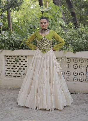 Attractive These Navratri Special Lehenga Choli in Fine Colored. These Lehenga Are Kora Cotton And Blouse Are Fabricated On Faux Georgette Fabriced. It is Beautified With Lahariya Printed Designer With Mirror Lace Work.