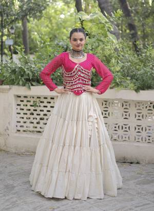 Attractive These Navratri Special Lehenga Choli in Fine Colored. These Lehenga Are Kora Cotton And Blouse Are Fabricated On Faux Georgette Fabriced. It is Beautified With Lahariya Printed Designer With Mirror Lace Work.
