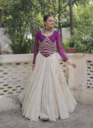 Attractive These Navratri Special Lehenga Choli in Fine Colored. These Lehenga Are Kora Cotton And Blouse Are Fabricated On Faux Georgette Fabriced. It is Beautified With Lahariya Printed Designer With Mirror Lace Work.
