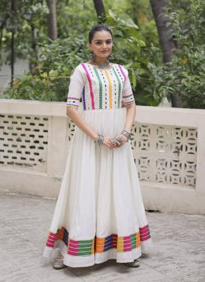 Garb These Beautiful Looking Readymade Navrati Long Gown.These Gown is Fabricated On Roman Silk.Its Beautified With Disigner Multy Thread,Mirror Embroidery Work.