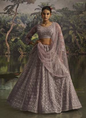 For A Designer Look,Grab These Lehenga Choli in Fine Colored.These Lehenga And Choli Are Fabricated On Soft Net Pair With Soft Net Dupatta.Its Beautified With Designer Dori,Sequance,Thread Embroidery,Beads,Swarovski Work.
