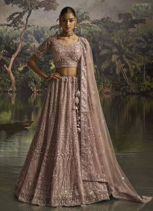 For A Designer Look,Grab These Lehenga Choli in Fine Colored.These Lehenga And Choli Are Fabricated On Soft Net Pair With Soft Net Dupatta.Its Beautified With Designer Dori,Sequance,Thread Embroidery,Zarkan Work.