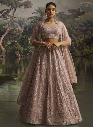 For A Designer Look,Grab These Lehenga Choli in Fine Colored.These Lehenga And Choli Are Fabricated On Soft Net Pair With Soft Net Dupatta.Its Beautified With Designer Dori,Sequance,Thread Embroidery,Zarkan Work.
