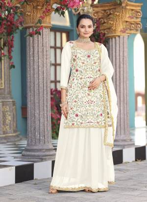 Attrective Looking These Party Wear Plazzo Skirt Suit in Fine Colored Pair With Bottom And Dupatta.These Top Are Georgette And Dupatta Are Fabricated On Net Pair With Georgette Bottom.Its Beautified With Designer Heavy Embroidery Work.