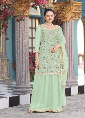 Attrective Looking These Party Wear Plazzo Skirt Suit in Fine Colored Pair With Bottom And Dupatta.These Top Are Georgette And Dupatta Are Fabricated On Net Pair With Georgette Bottom.Its Beautified With Designer Heavy Embroidery Work.