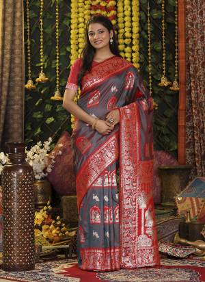 Garb These Fastive And Party Wear Saree in Fine Colored.These Saree And Blouse is Fabricated On Silk.Its Beautified With Heavy Woven Jari Designer.