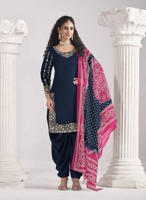 Looking These Beautiful Party Wear Fine Color Salwar Suits.These Top Are Roman Silk And Dupatta Are Chanderi Silk And Bottom Santoon Fabricated.Its Beautified With Designer Embroidery Work With Printed Dupatta.