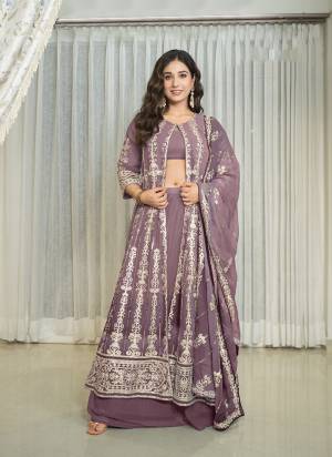 Attrective These Party Wear Skirt Suit in Fine Colored Pair With Bottom And Dupatta.These Top Are Georgette And Dupatta Are Fabricated On Georgette Pair With Georgette Bottom.Its Beautified With Designer Heavy Embroidery Work.