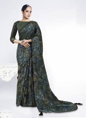 Look Attractive These Designer Party Wear Saree in Fine Colored.These Saree Are Brosso And Blouse Raw Silk is Fabricated.Its Beautified Embroidery With Stone Hand  Work Desiger With Digital Printed.
