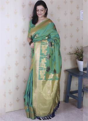 Garb These Party Wear Saree in Fine Colored.These Saree And Blouse is Fabricated On Soft Silk.Its Beautified With Weaving Meenakari Designer.