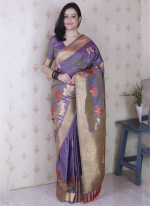Garb These Party Wear Saree in Fine Colored.These Saree And Blouse is Fabricated On Soft Silk.Its Beautified With Weaving Meenakari Designer.