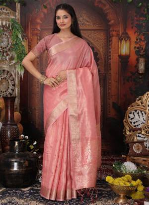 Looking These Fastive And Party Wear Saree in Fine Colored.These Saree And Blouse is Fabricated On Organza.Its Beautified With Heavy Woven Designer.
