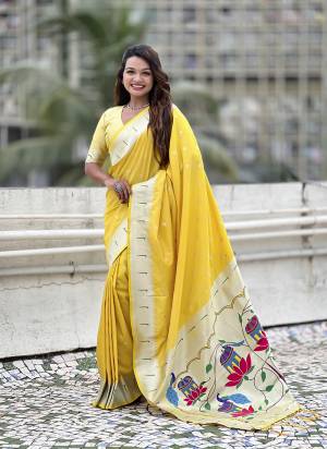 Attractive These Party Wear Saree in Fine Colored.These Saree And Blouse is Fabricated On Paithani Silk.Its Beautified With Weaving Silver Jari, Meenakari Peacock Designer.
