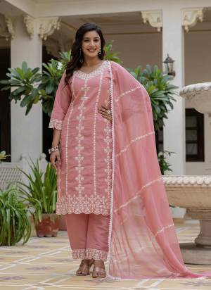 Looking These Suit in Fine Colored Pair With Bottom And Dupatta.These Top Are Roman Silk And Bottom Are Fabricated On Roman Silk Pair With Organza Dupatta.Its Beautified With Designer Embroidery Work.