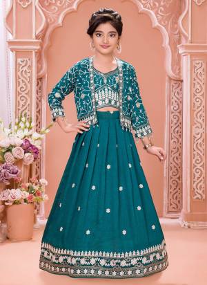 For A Designer Look,Grab These Kidswear Readymade Lehenga Choli Wih Koti in Fine Colored.These Lehenga And Choli Are Fabricated On Soft Silk Pair With Soft Silk Koti.Its Beautified With Designer Thread,Sequance Embroidery Work.